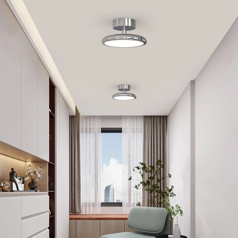 Novoora minimalist LED ceiling light with a modern iron and acrylic design installed in a bright living room.