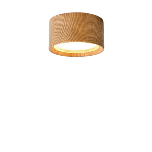Novoora modern round LED ceiling light with a natural wood finish, casting a warm glow on a white wall.