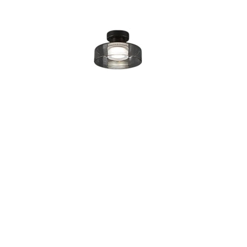 Novoora smoked glass LED ceiling light with a black iron base, installed in a modern minimalist hallway.